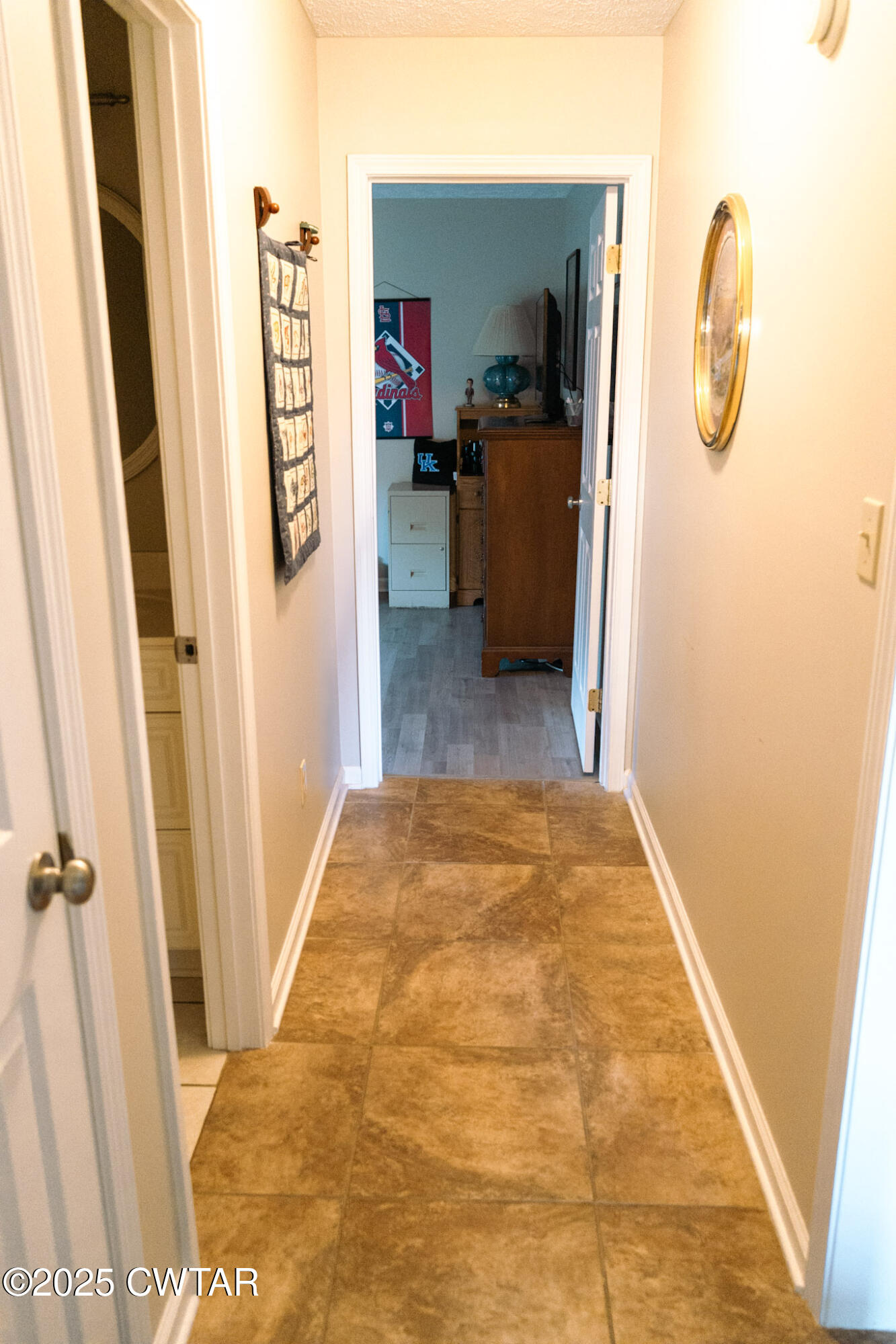 15 Battery Cove Jackson, TN 38305 - Photo 10 of 25 a view of a hallway with wooden floor and closet