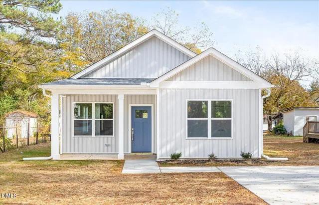 a view of house with outdoor space