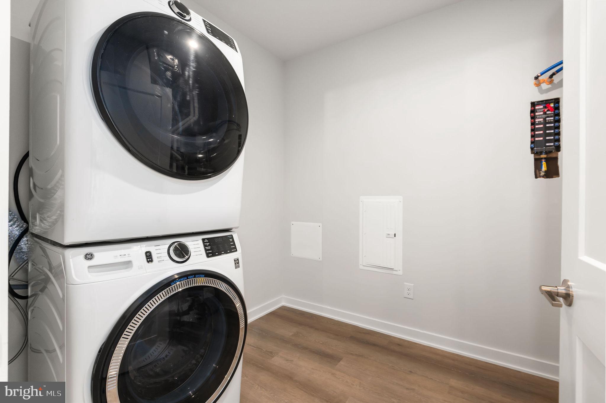 26 South York Road, Unit 403 Hatboro, PA 19040 - Photo 17 of 51 a view of a hallway with washer and dryer