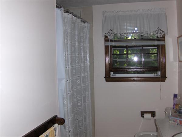 1754 Shirley Road Lancaster, MA 01523 - Photo 16 of 30 a bathroom with a sink and a mirror