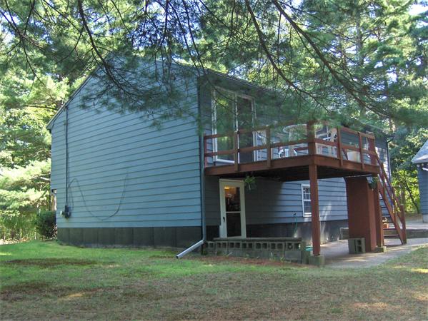 1754 Shirley Road Lancaster, MA 01523 - Photo 2 of 30 a front view of a house with garden