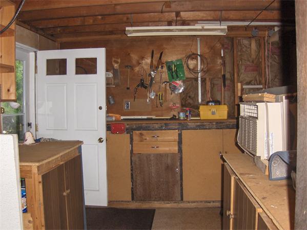 1754 Shirley Road Lancaster, MA 01523 - Photo 29 of 30 a kitchen with a refrigerator and a stove
