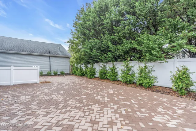 a view of a back yard of the house
