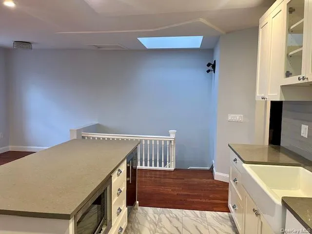a utility room with a sink a washer and dryer