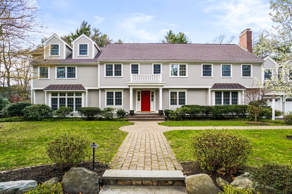 65 Myopia Road Winchester, MA 01890 - Photo 3 of 38 a front view of a residential houses with yard and green space