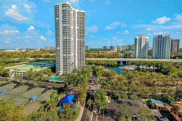 a view of a city with tall buildings