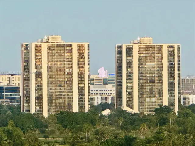 a front view of a building with glass windows