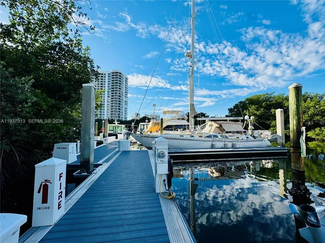 a terrace with outdoor seating and city view