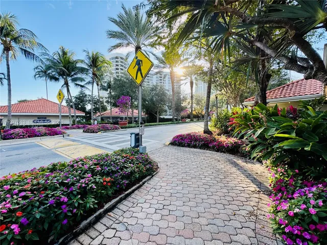 a view of a swimming pool with an outdoor seating