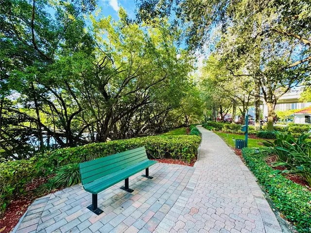 a view of a bench in the garden