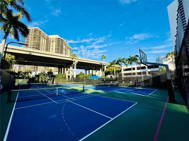 a view of an chairs and table on the patio