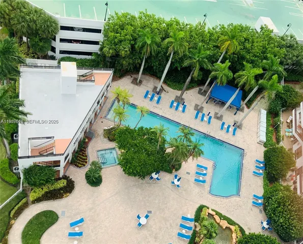 an aerial view of house with yard