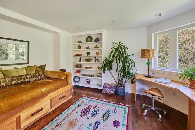 a view of outdoor space with lounge chairs