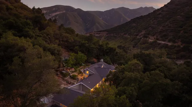 a view of outdoor space with signage and flags