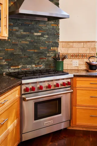 a dining table with chairs and wooden floor