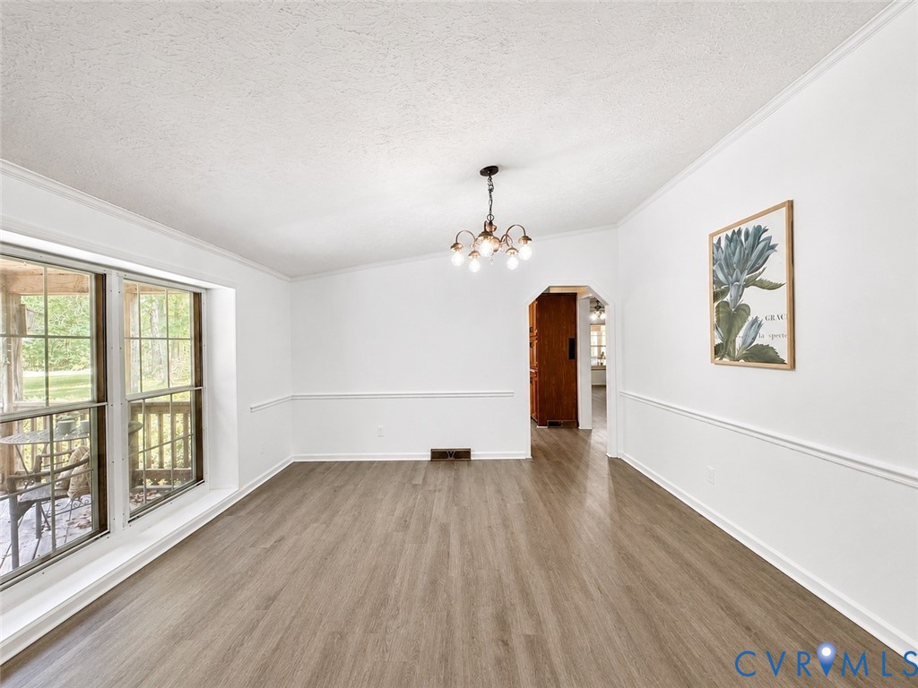 2229 Texas School Road Wingina, VA 24599 - Photo 10 of 22 Formal dining room with crown molding, chair rail