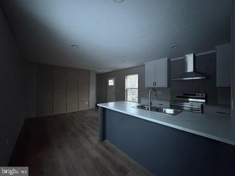 443 Fern Road Millville, NJ 08332 - Photo 11 of 24 a kitchen with granite countertop a sink cabinets and wooden floor