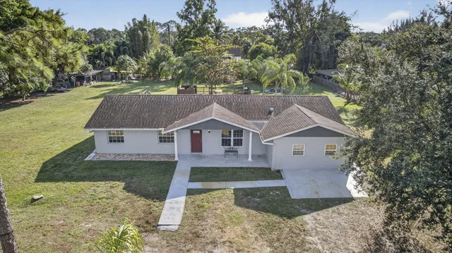 $625,000 | 16318 Glasgow Drive East, The Acreage, FL 33470