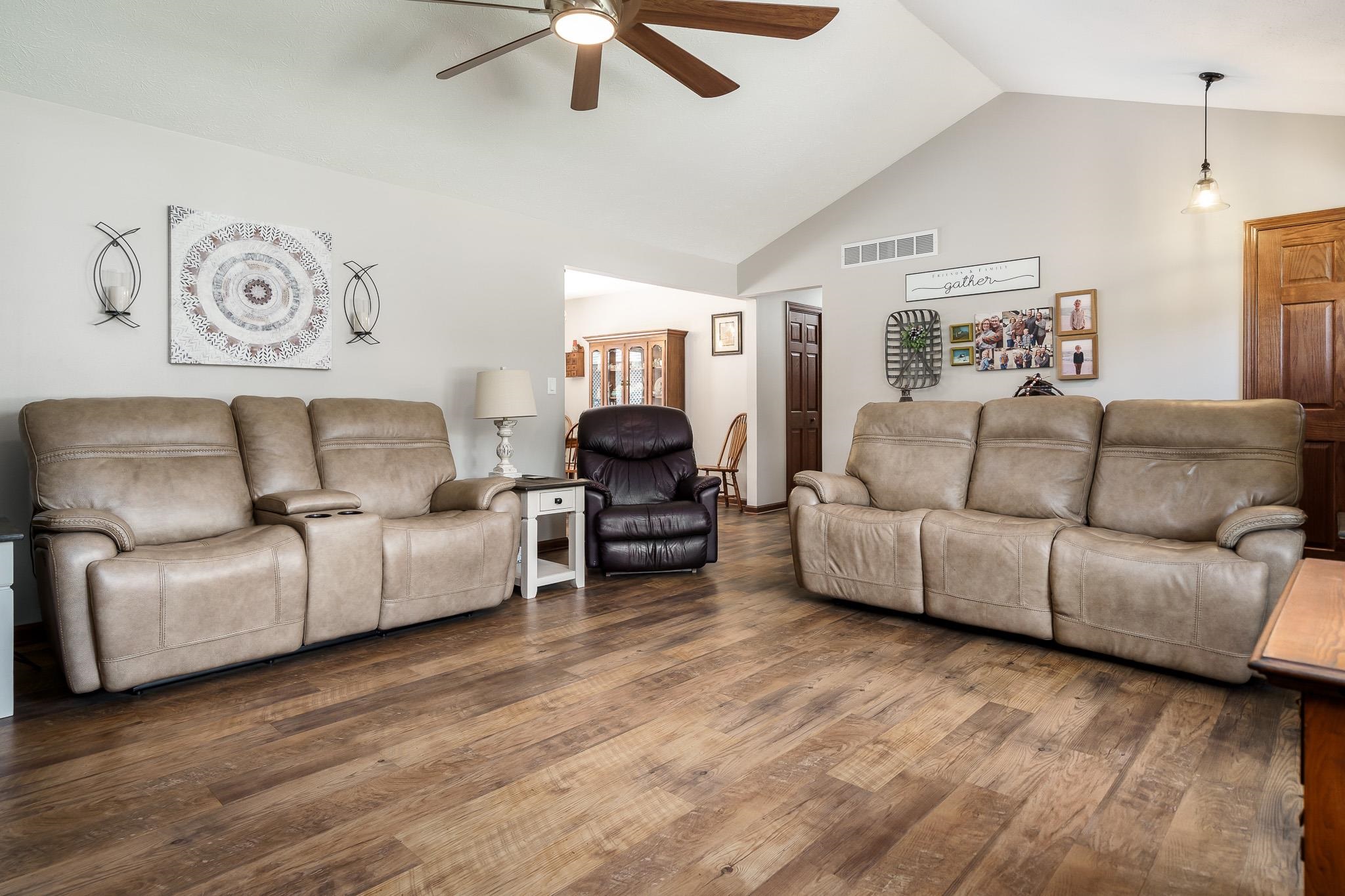 5671 Rural Edge Drive Roscoe, IL 61073 - Photo 8 of 51 a living room with furniture and a couch