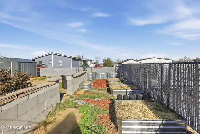 a view of a swimming pool with a lounge chairs