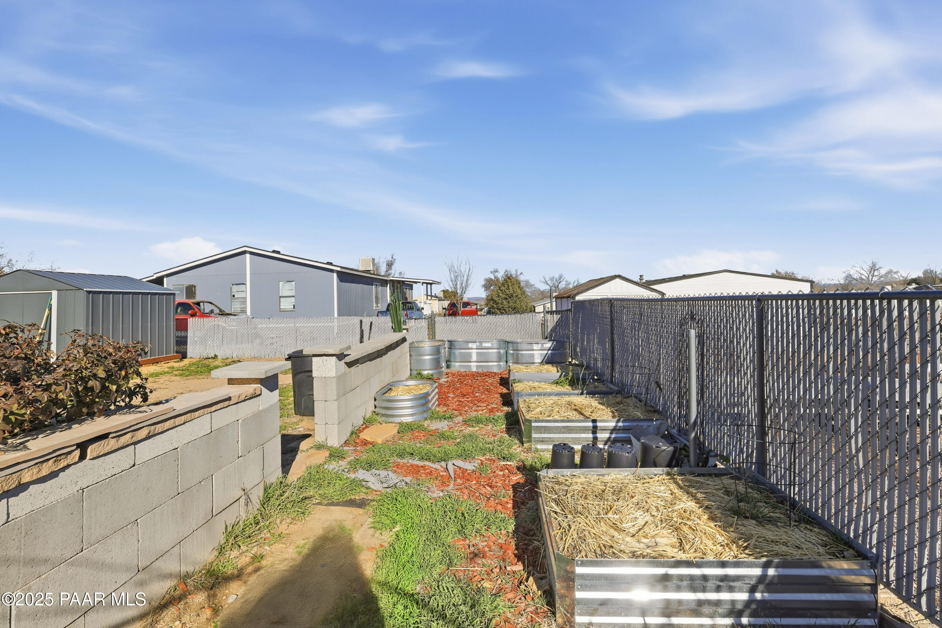 1810 Rhonda Road Chino Valley, AZ 86323 - Photo 26 of 29 a view of a swimming pool with a lounge chairs
