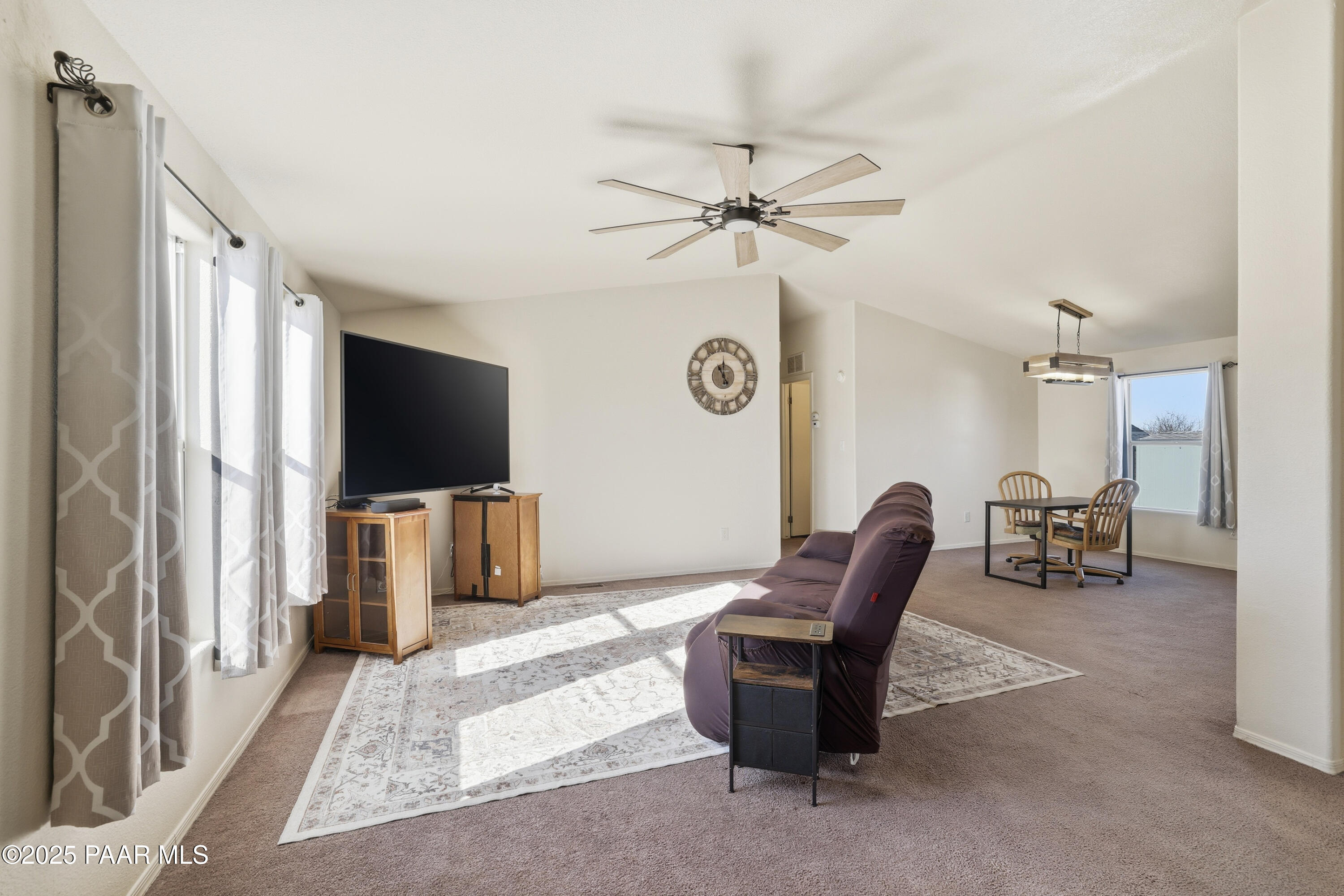 1810 Rhonda Road Chino Valley, AZ 86323 - Photo 4 of 29 a living room with furniture and a flat screen tv