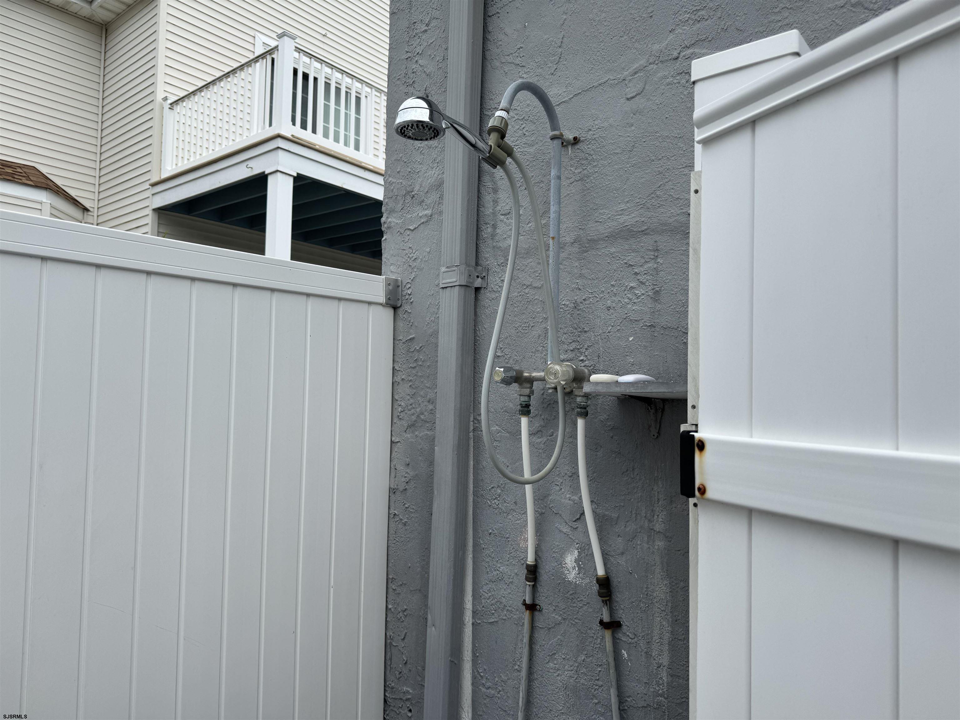 200 27th Street South Brigantine, NJ 08203 - Photo 24 of 33 a bathroom with a shower and mirror