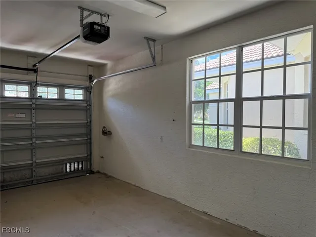 a bathroom with a glass door shower