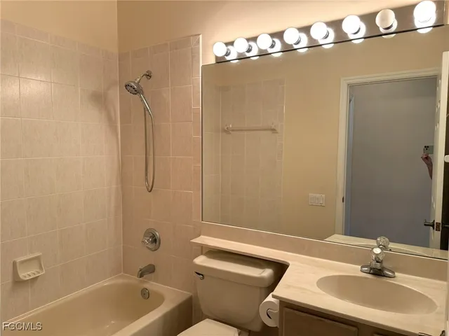 a view of hallway with windows