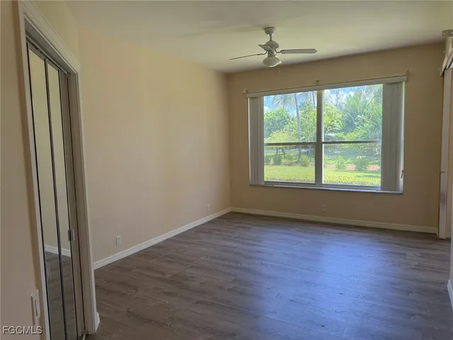 a view of a sitting area with furniture and garden