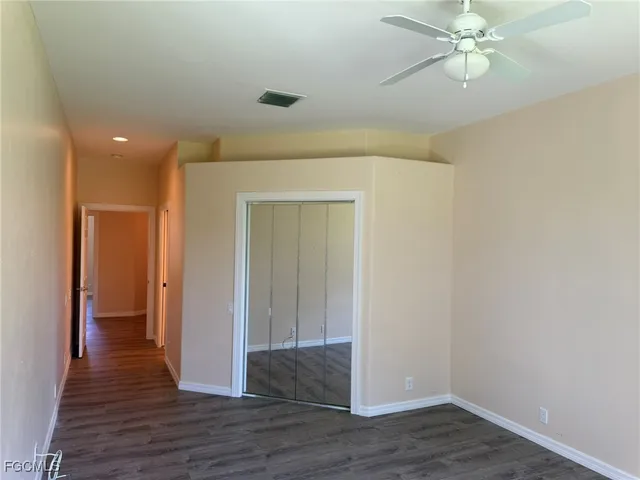 a kitchen with a dining table chairs and view kitchen