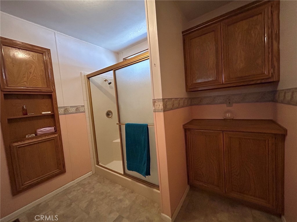 27250 Murrieta Road, Unit 347 Menifee, CA 92586 - Photo 22 of 39 a view of kitchen with refrigerator cabinets and microwave