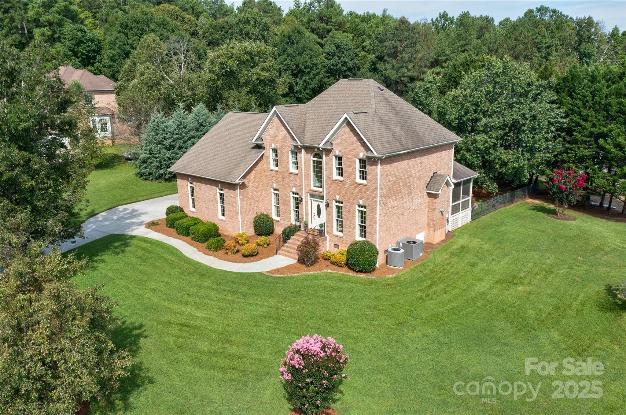 a aerial view of a house with garden