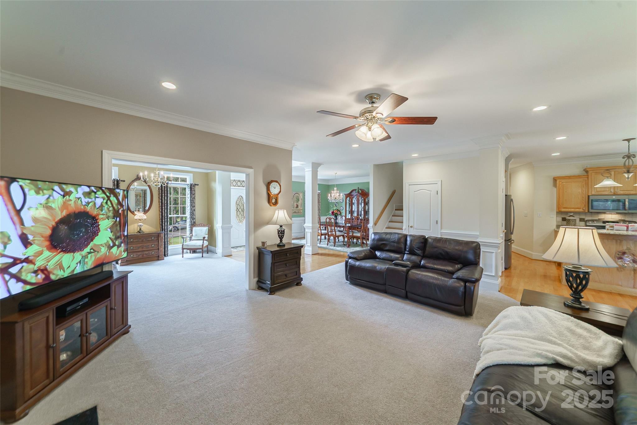 241 Old Springs Road Fort Mill, SC 29715 - Photo 11 of 48 a living room with furniture and a flat screen tv