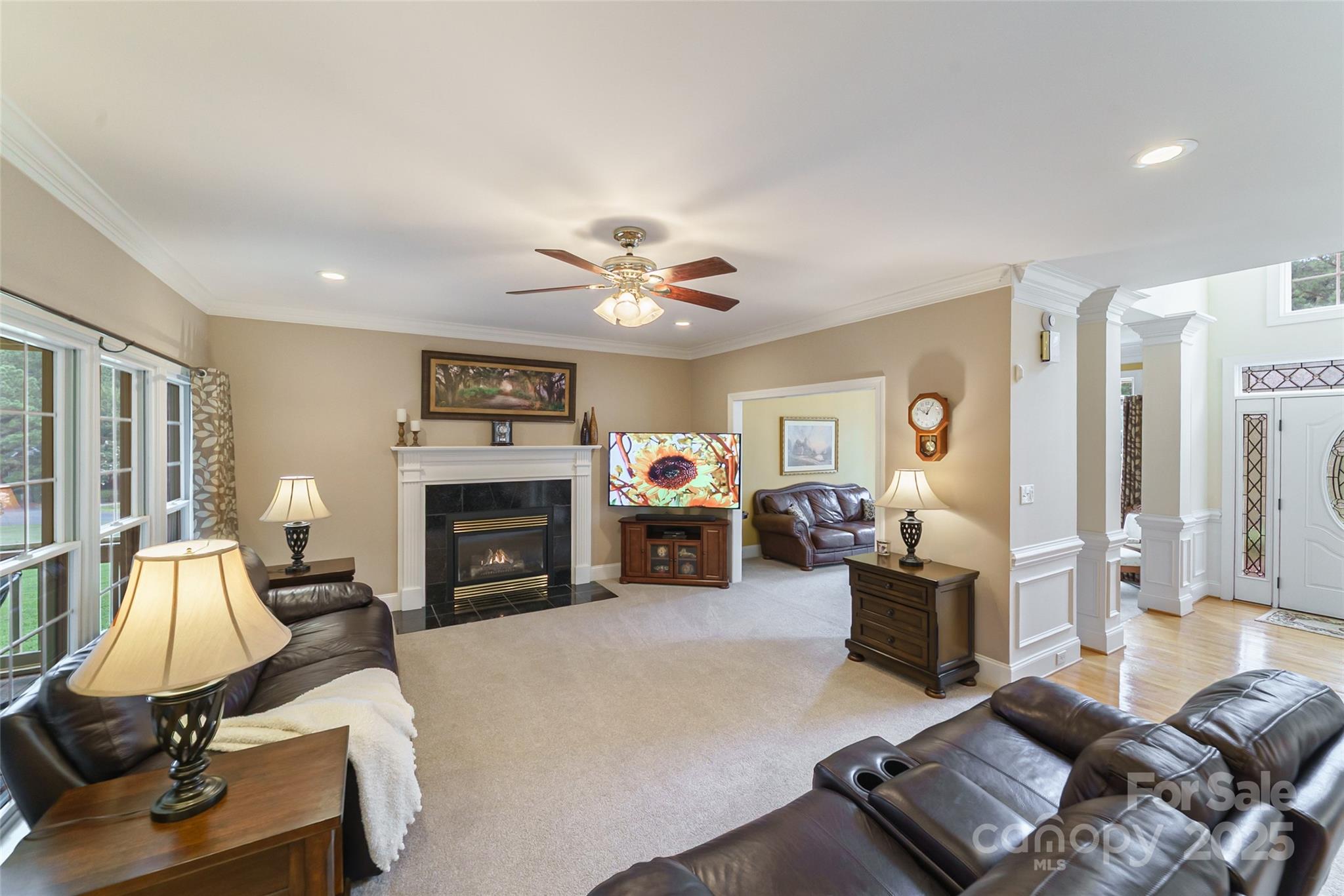 241 Old Springs Road Fort Mill, SC 29715 - Photo 13 of 48 a living room with furniture and a fireplace