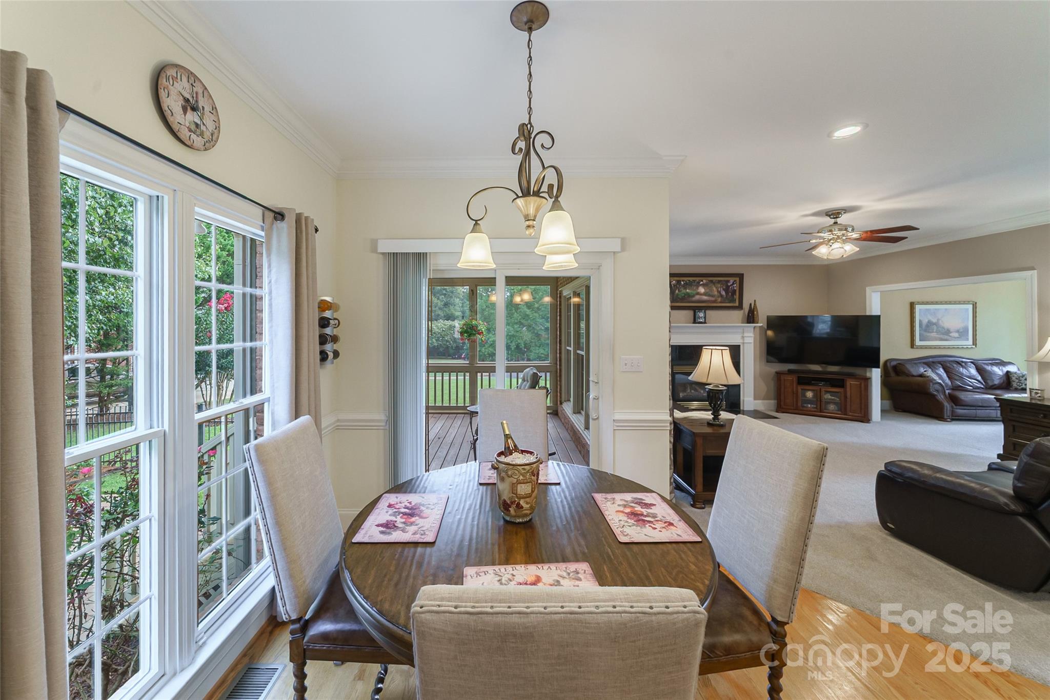 241 Old Springs Road Fort Mill, SC 29715 - Photo 19 of 48 a living room with furniture a table and a large window
