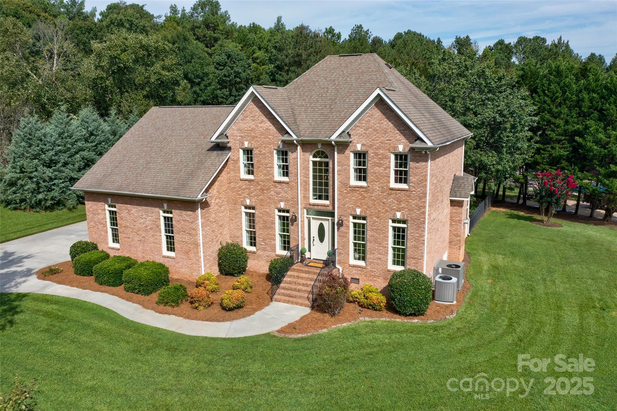 241 Old Springs Road Fort Mill, SC 29715 - Photo 2 of 48 a aerial view of a house with yard and green space
