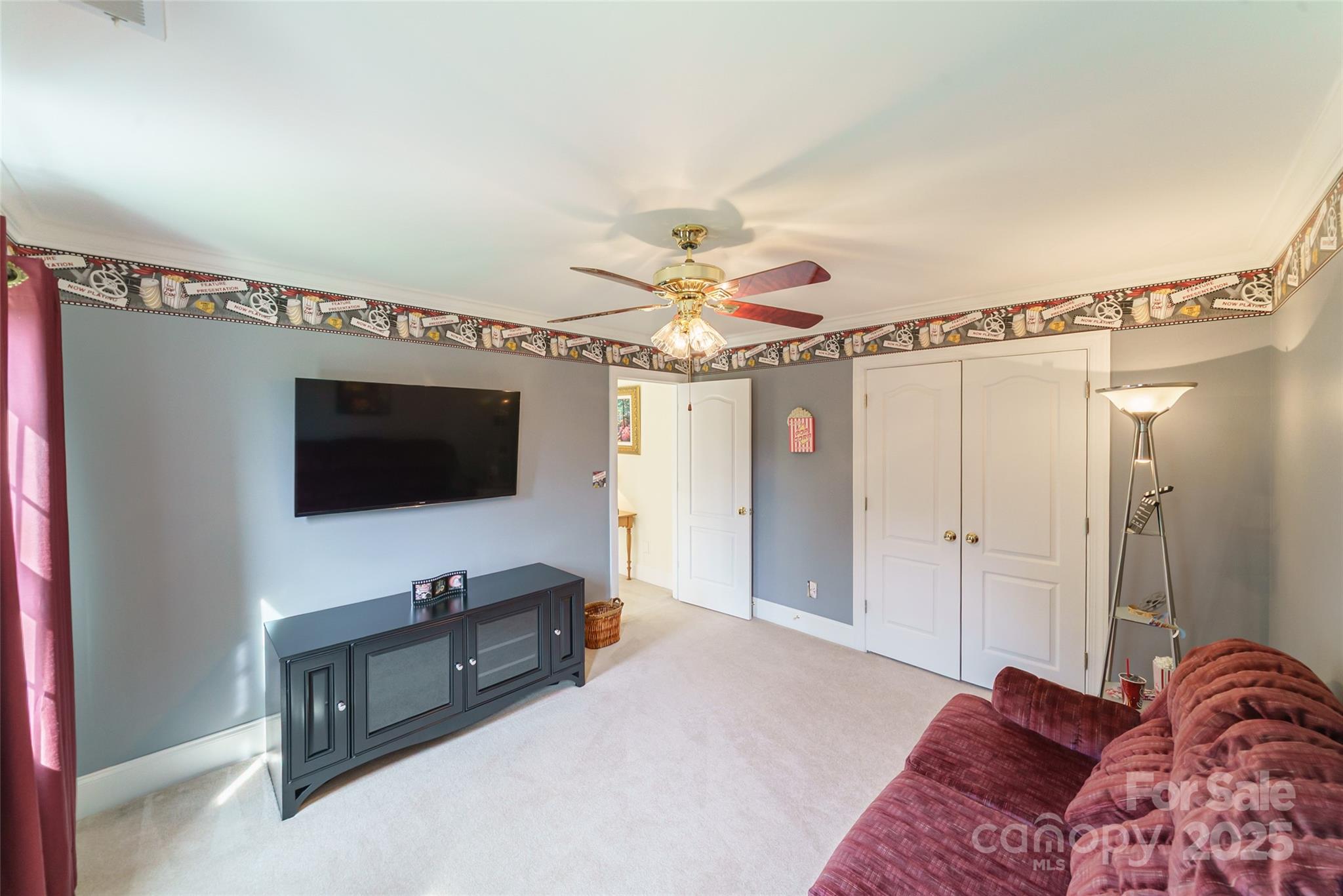 241 Old Springs Road Fort Mill, SC 29715 - Photo 28 of 48 a living room with furniture and a flat screen tv