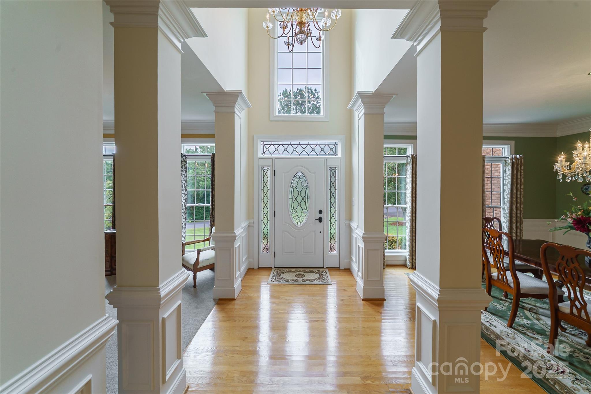 241 Old Springs Road Fort Mill, SC 29715 - Photo 4 of 48 a view of a hallway with wooden floor and windows