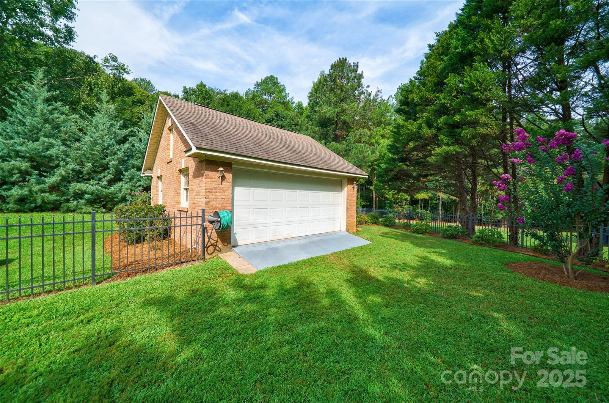 241 Old Springs Road Fort Mill, SC 29715 - Photo 43 of 48 a view of a back yard of the house
