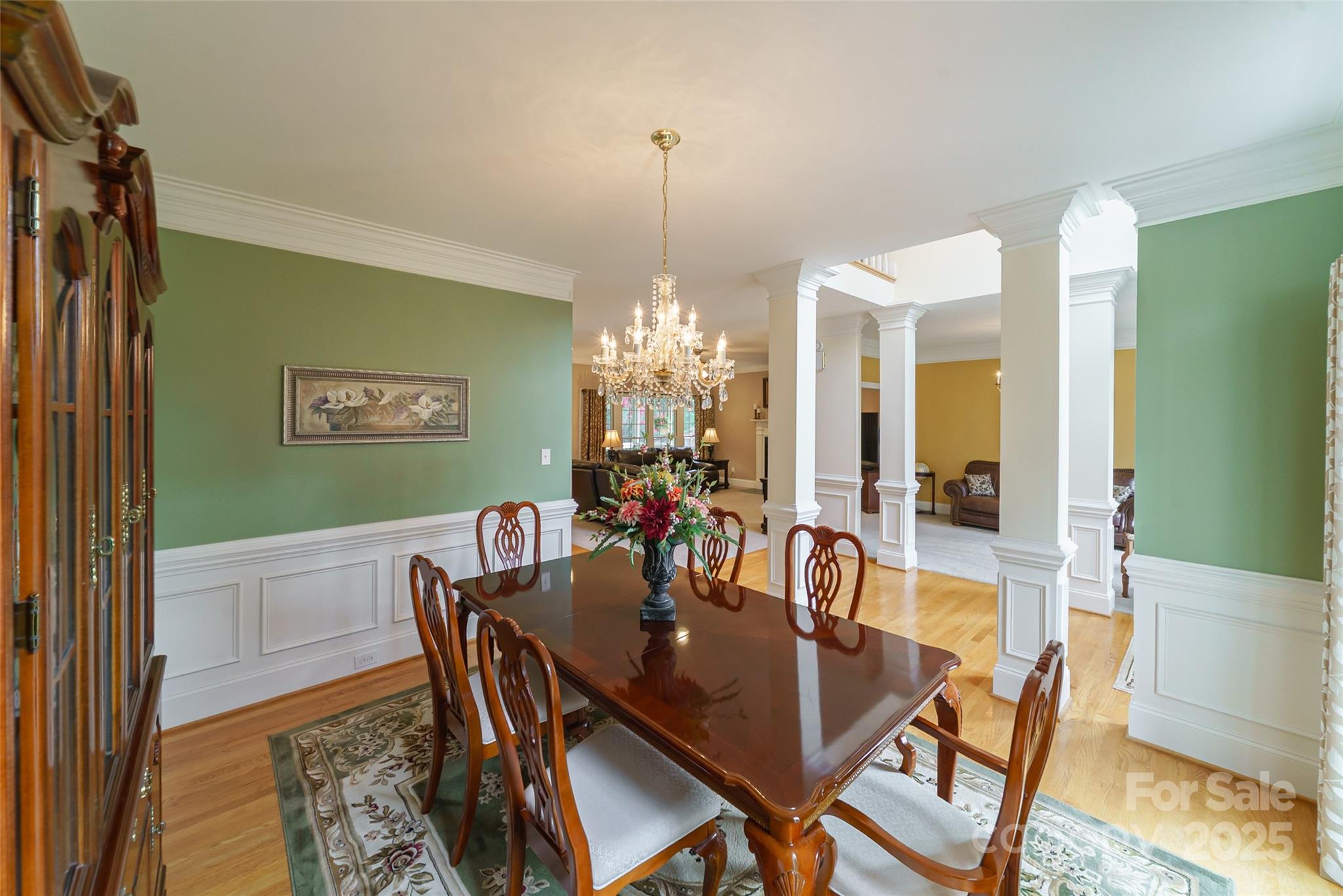 241 Old Springs Road Fort Mill, SC 29715 - Photo 7 of 48 a view of a dining room with furniture and chandelier