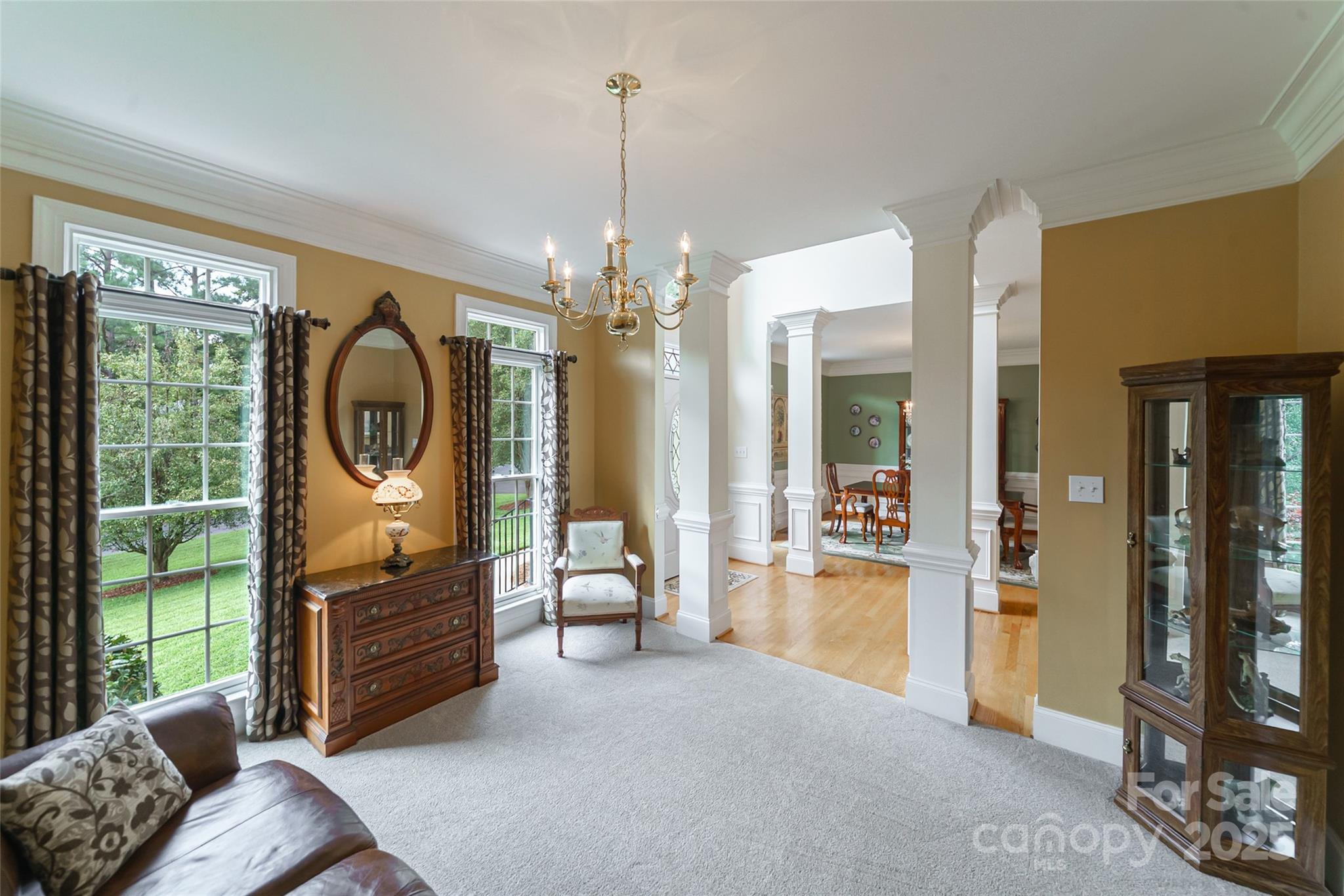 241 Old Springs Road Fort Mill, SC 29715 - Photo 9 of 48 a living room with furniture a window and a dining table