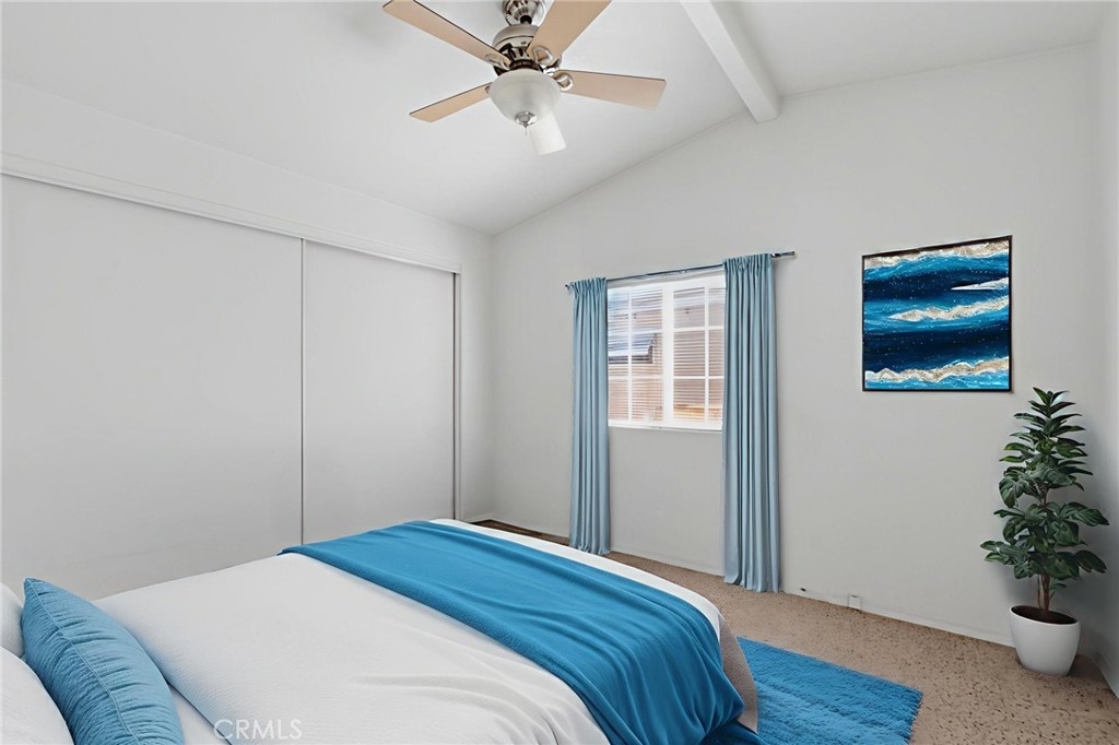 12147 Lakeland Road, Unit 9 Santa Fe Springs, CA 90670 - Photo 11 of 23 a bedroom with a bed and a potted plant