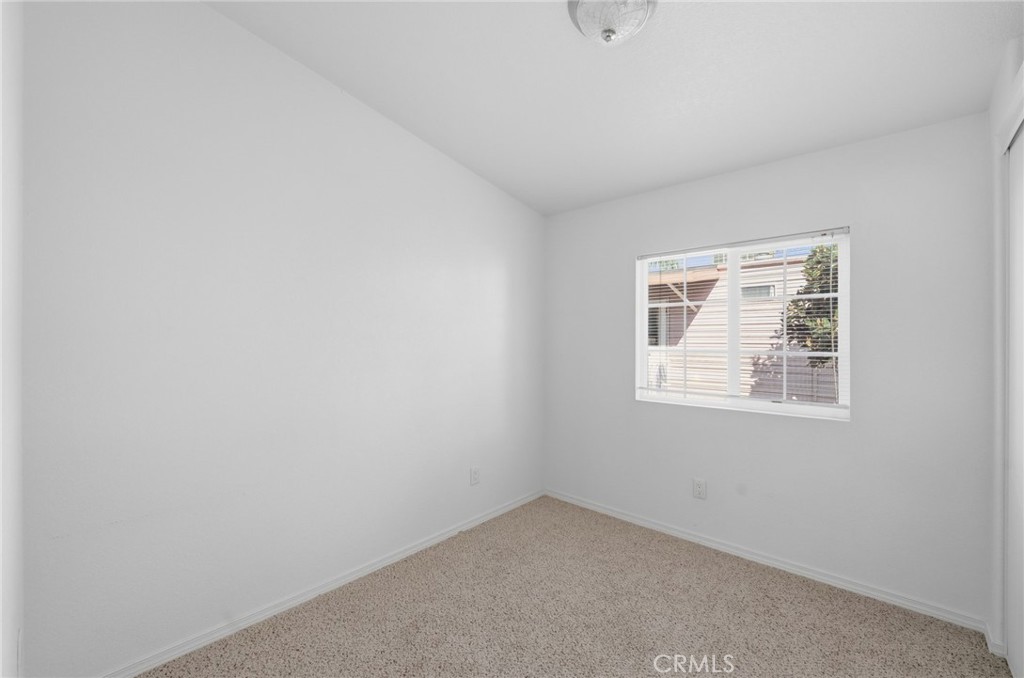 12147 Lakeland Road, Unit 9 Santa Fe Springs, CA 90670 - Photo 12 of 23 an empty room with a window