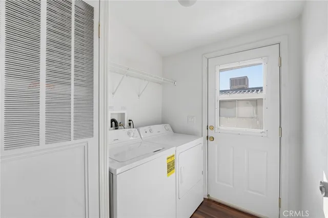 a view of a swimming pool with a yard