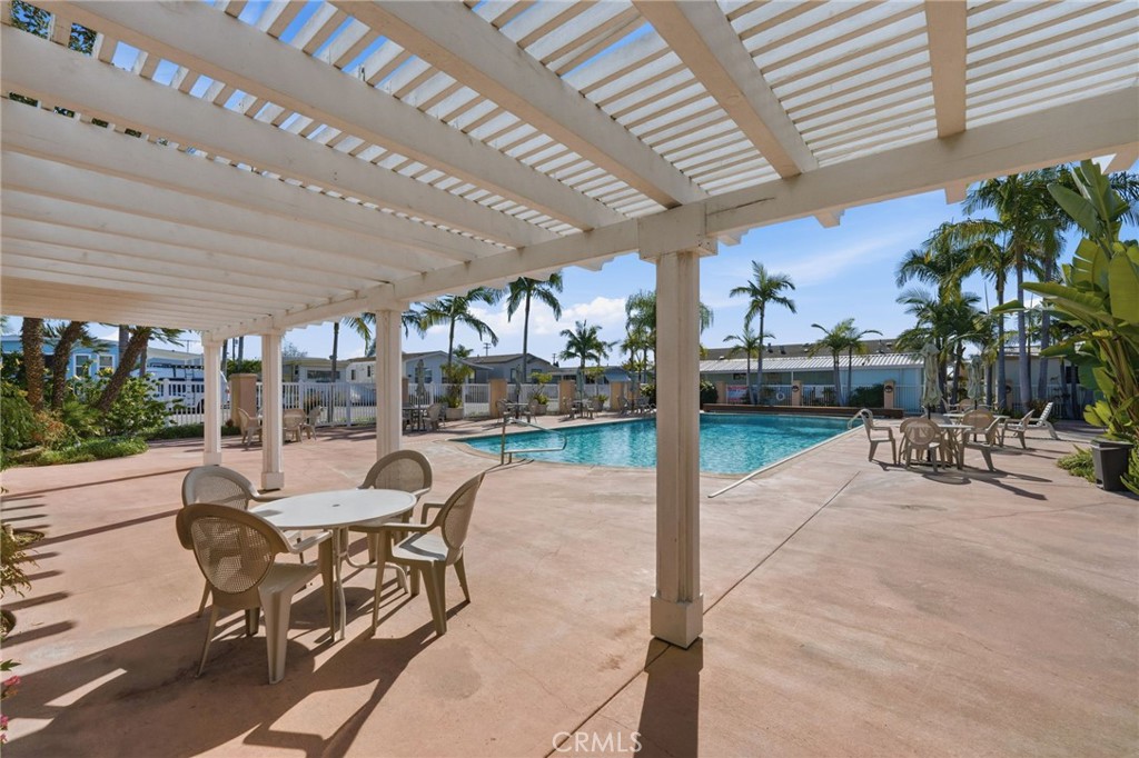 12147 Lakeland Road, Unit 9 Santa Fe Springs, CA 90670 - Photo 19 of 23 a patio with yard and outdoor seating