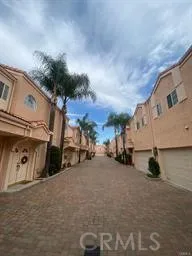 a view of a street with cars