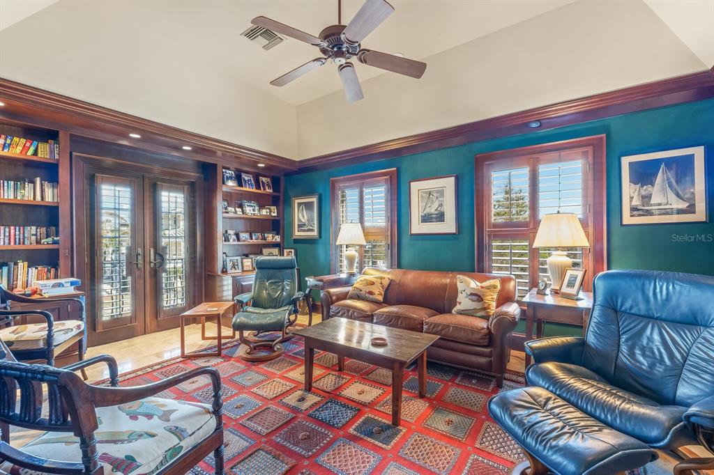 2571 Shore Lane Boca Grande, FL 33921 - Photo 10 of 38 a living room with furniture and a large window