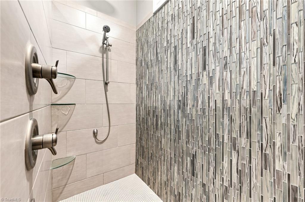5306 Rockingham Road East Greensboro, NC 27407 - Photo 19 of 47 Oversized shower featuring gorgeous tile-work.