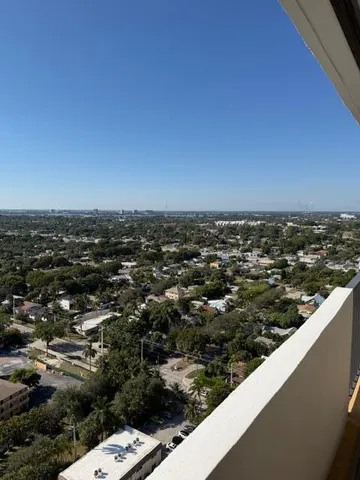 an aerial view of residential house with ocean view